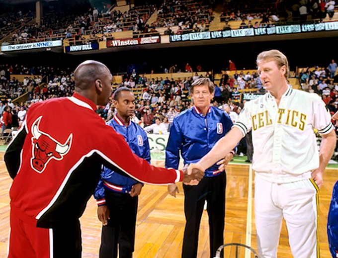 Michael Jordan Picture: MJ and Larry Bird shaking hands before a 1991 game. Picture 8. Photo by Steve Lipofsky
