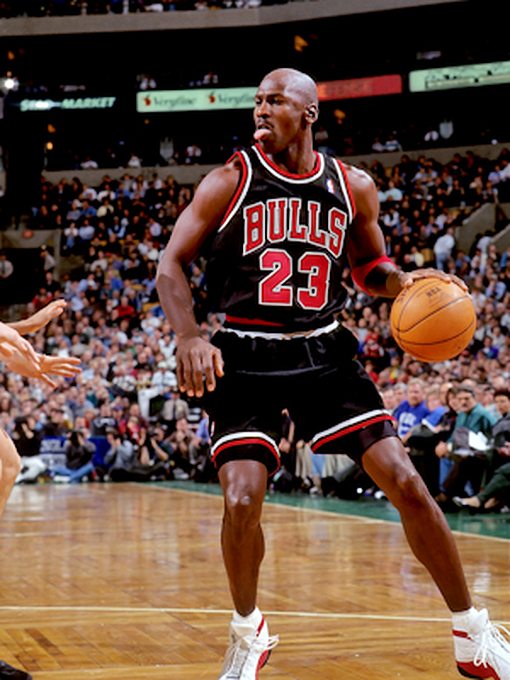 Michael Jordan Picture: MJ wearing a black Bulls Jersey in the 1997-1998 NBA Season. Picture 26. Photo by Steve Lipofsky