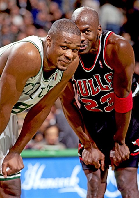Michael Jordan Picture: MJ talking with Antoine Walker in a Bulls-Celtics game in the 1997-98 season. Picture 27. Photo by Steve Lipofsky