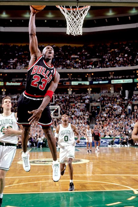 Michael Jordan Picture: MJ dunks the ball in a fastbreak against the Celtics in a 1997-98 season game. Picture 29. Photo by Steve Lipofsky